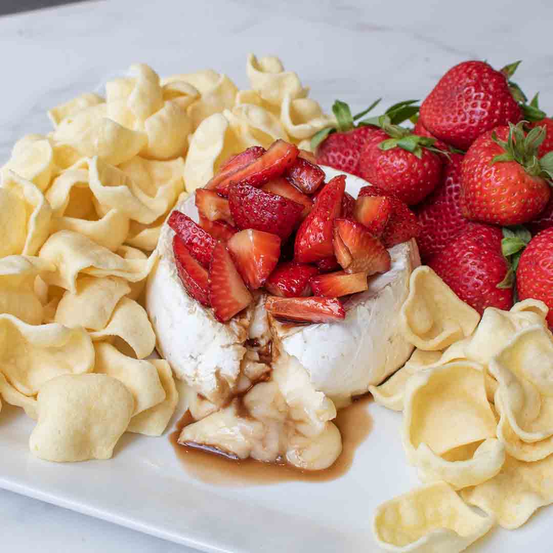 Lentil Sea Salt Chips with baked brie and strawberries